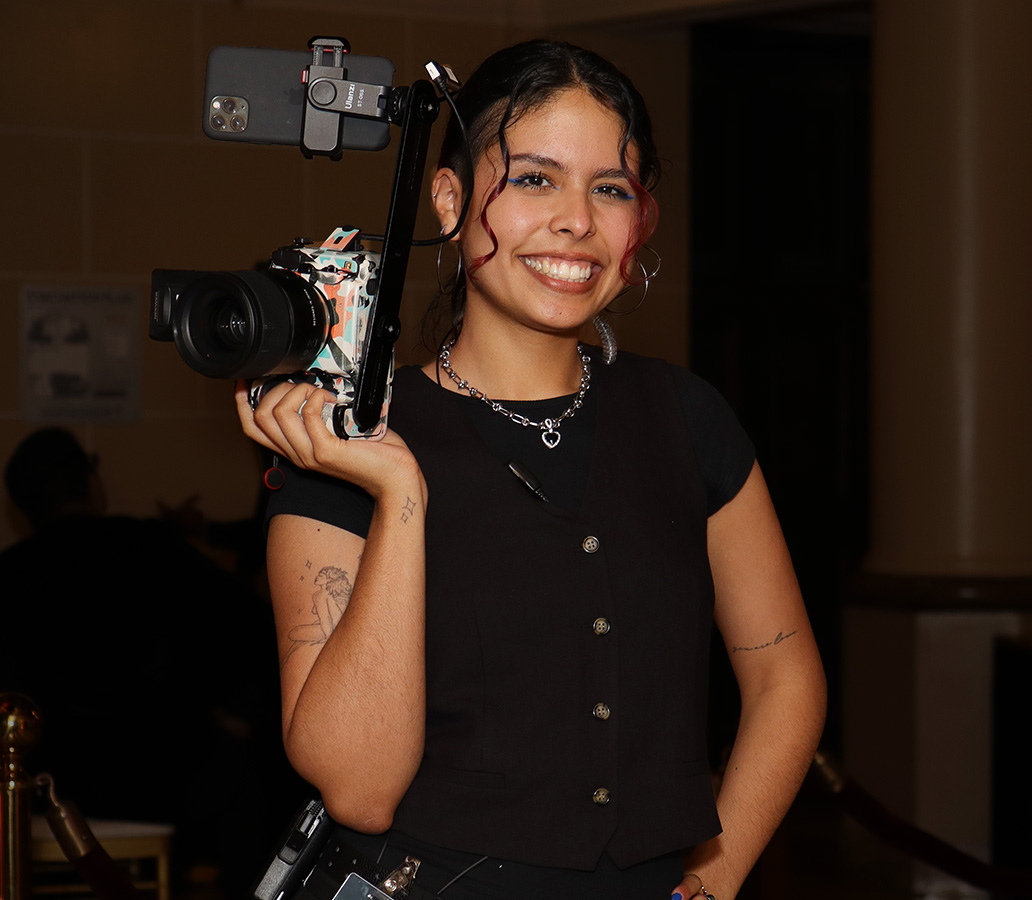 Photographer Alyssa with camera
