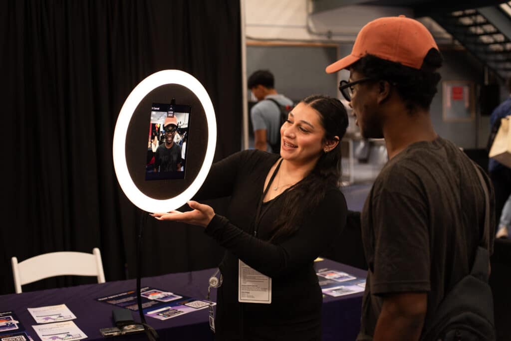 two people interacting with ring photobooth