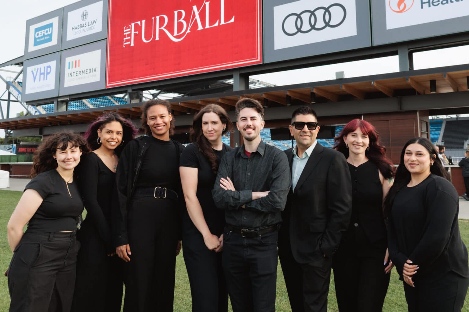 Pop Life Photo team at The FURBALL event, showcasing collaborative creativity and exceptional service.