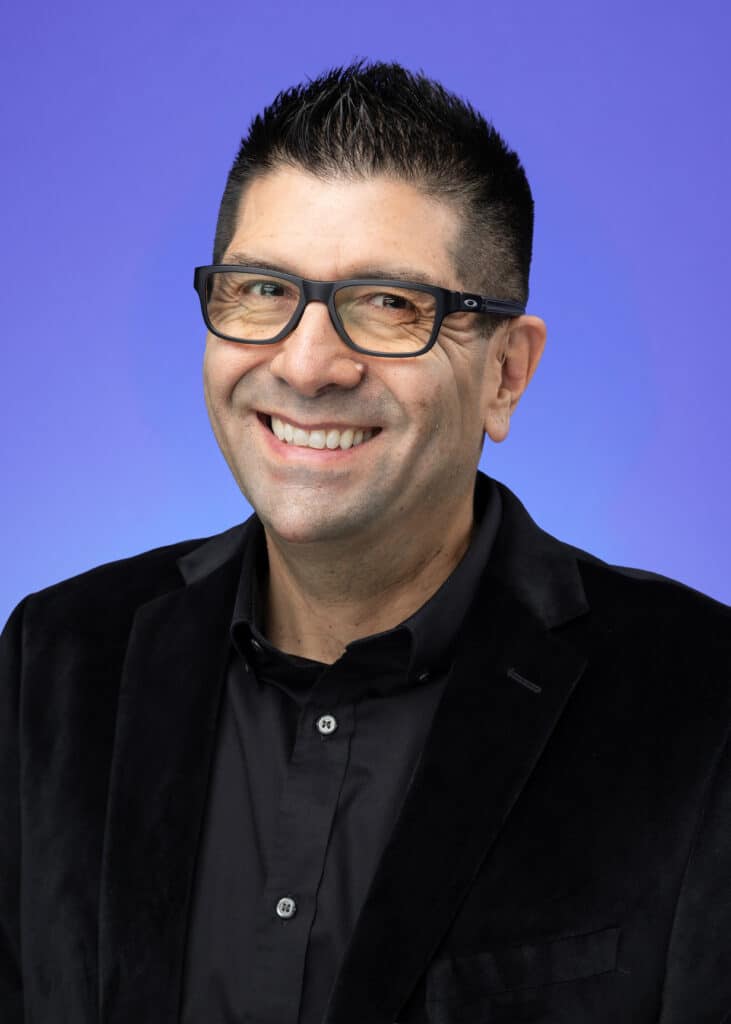 Pop Life Photo team member smiling, representing excellence and collaboration in Walnut Creek, CA.