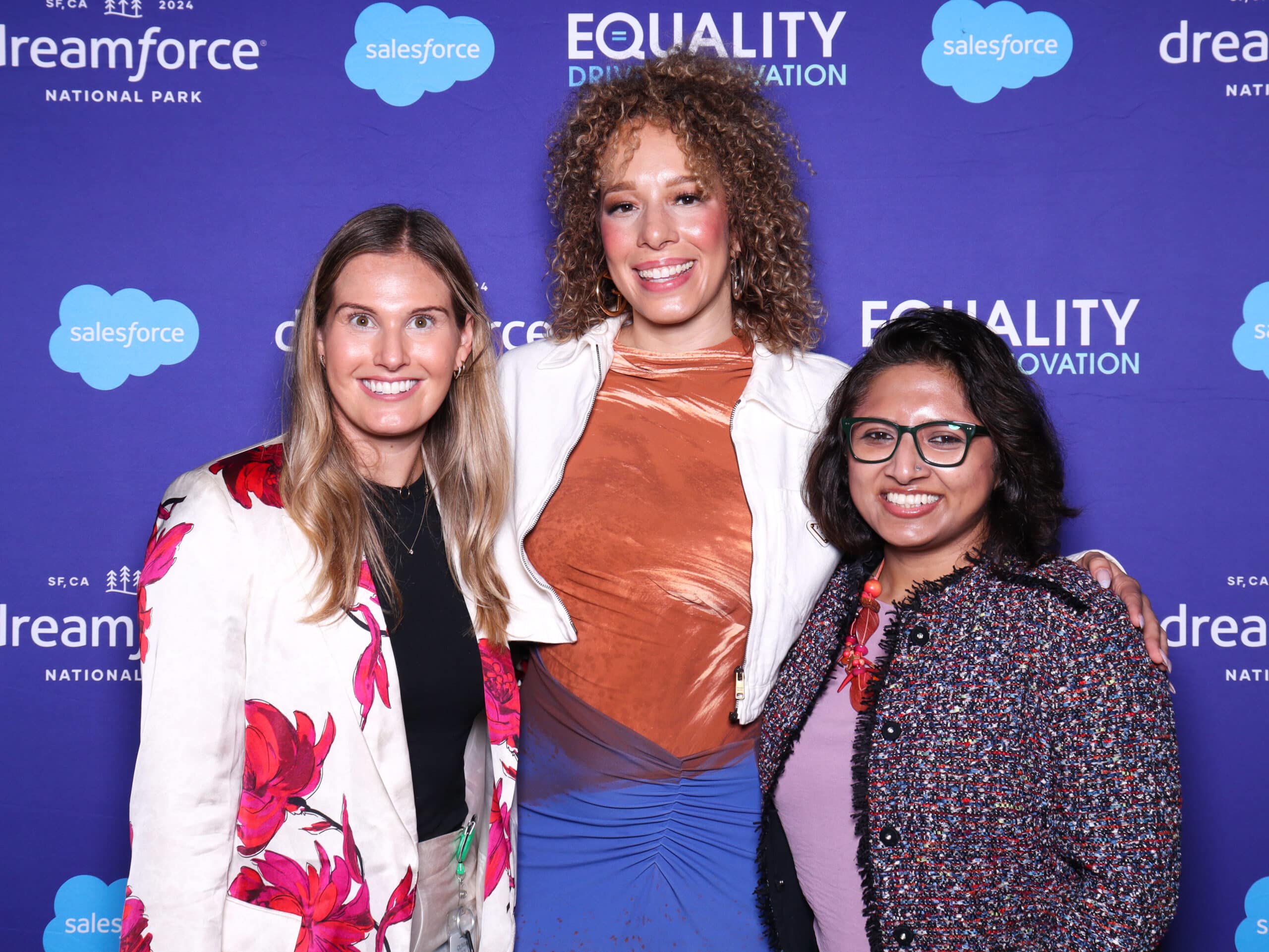 Branded corporate photo booth with Salesforce and Equality logos, guests posing for event photos.