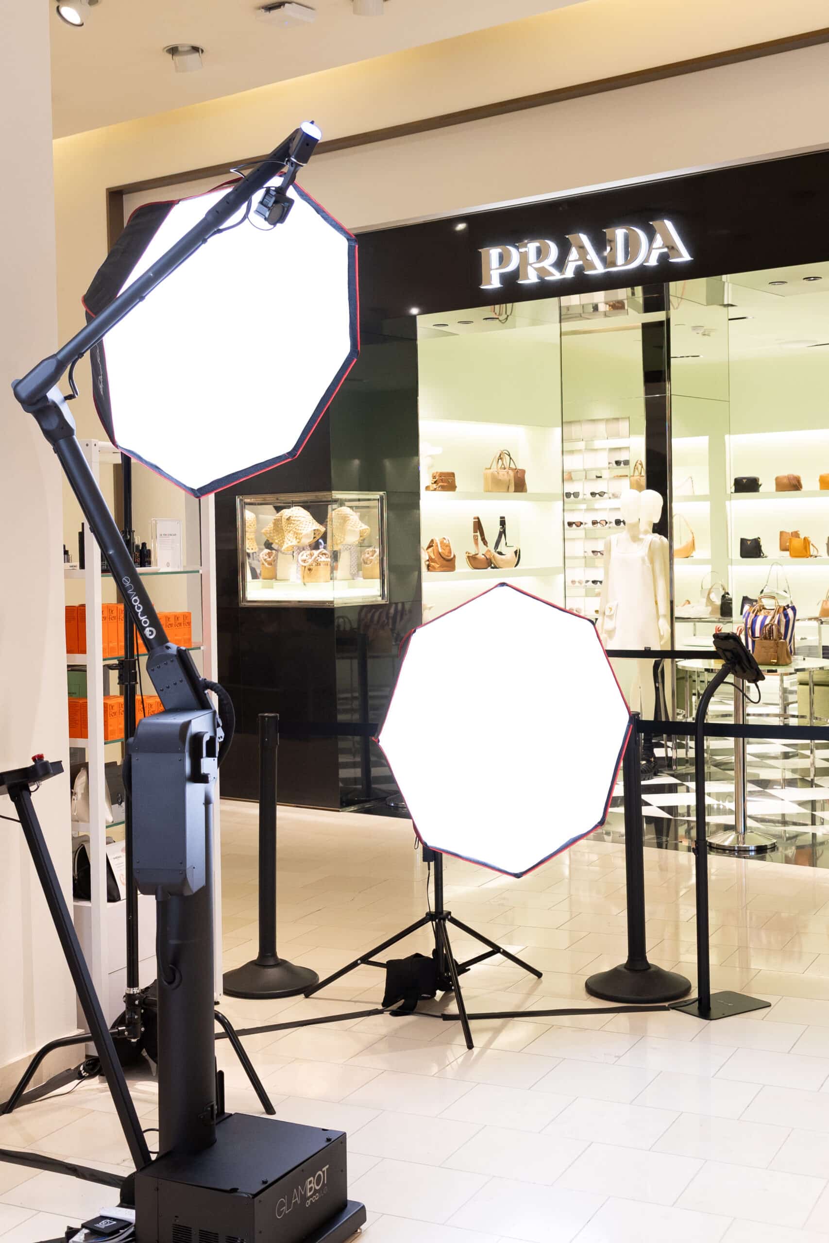 Glambot video activation setup with lighting equipment in front of a Prada store, enhancing luxury shopping experience at Neiman Marcus.
