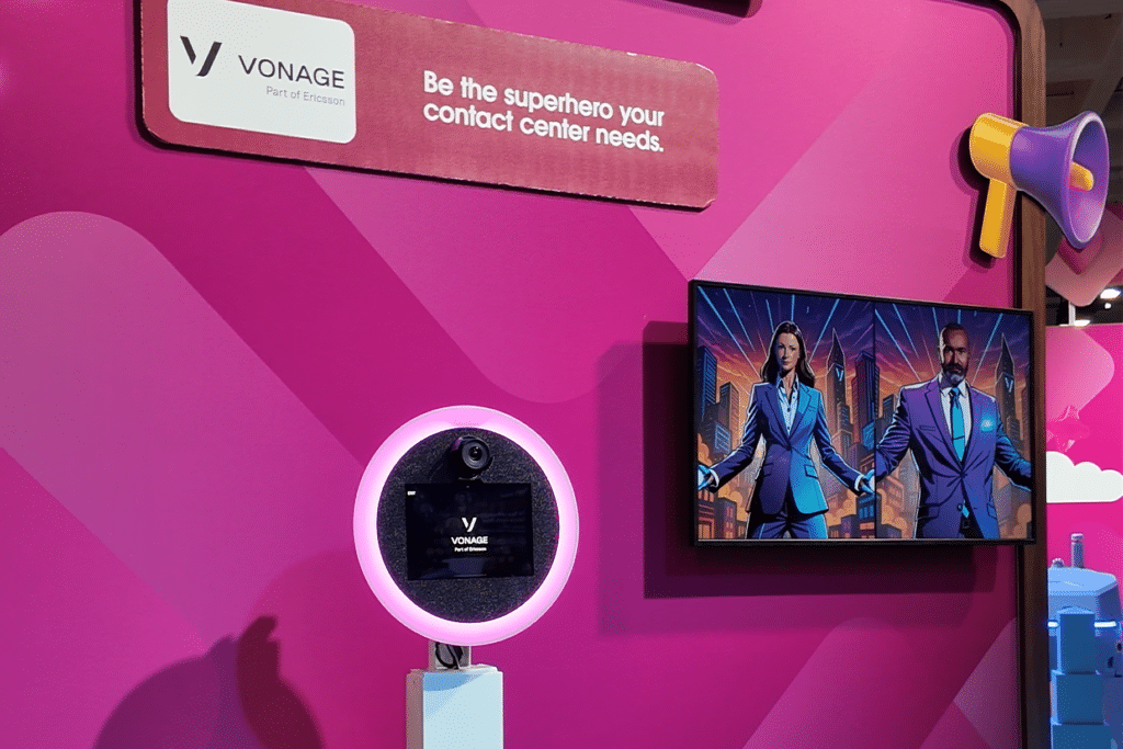 Vonage branded photo booth with digital display and megaphone, showcasing AI-powered photo experiences.